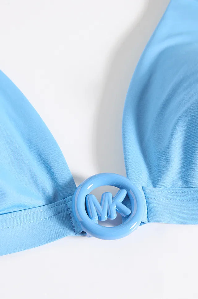 Michael Kors - close up of blue bikini top with logo hardware detail